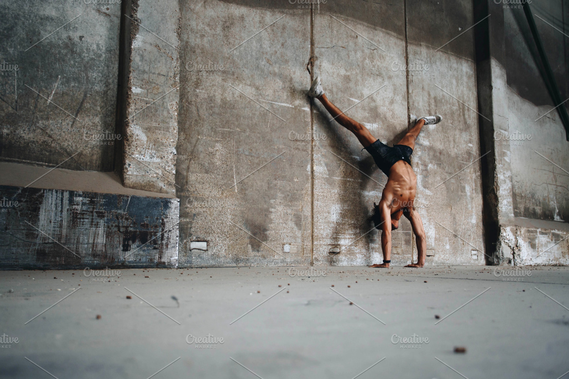 Fit man doing handstand split, a Sports & Recreation Photo by tetihalva