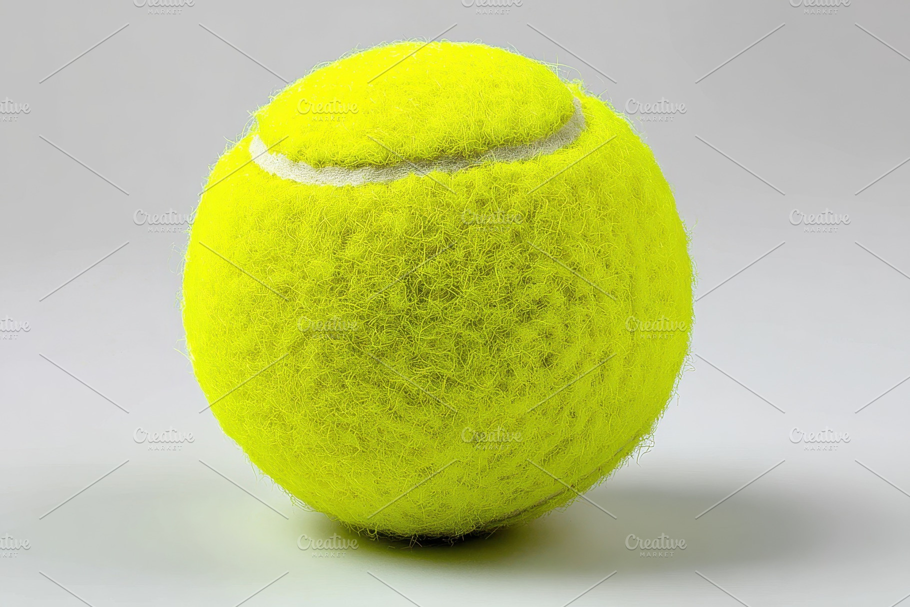 Tennis ball close-up vibrant yellow, a Photo by Pixeness Studio