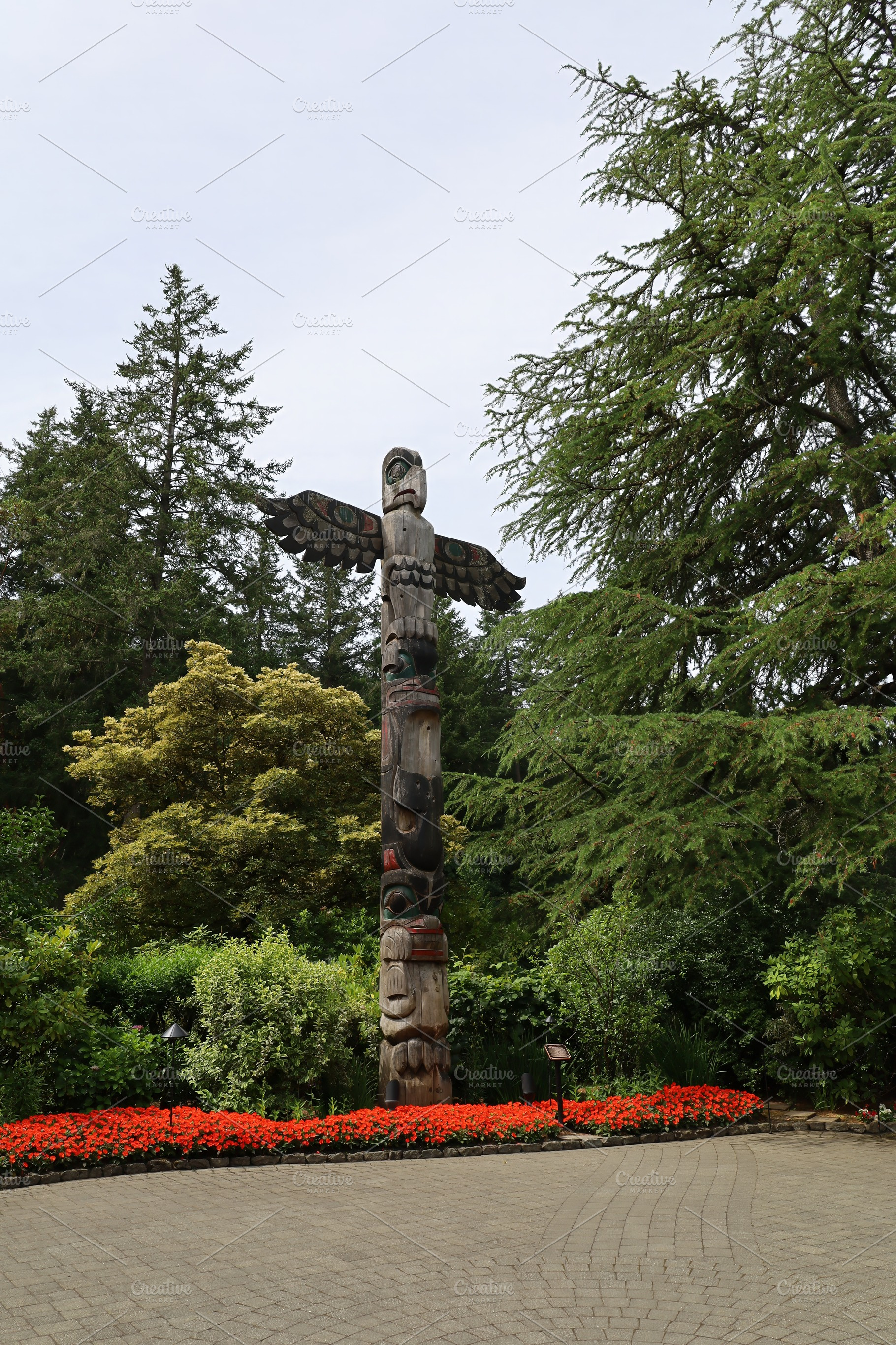 Totem poles at Buchart gardens, Victoria, British Columbia, Cana, a Nature Photo by uncreative