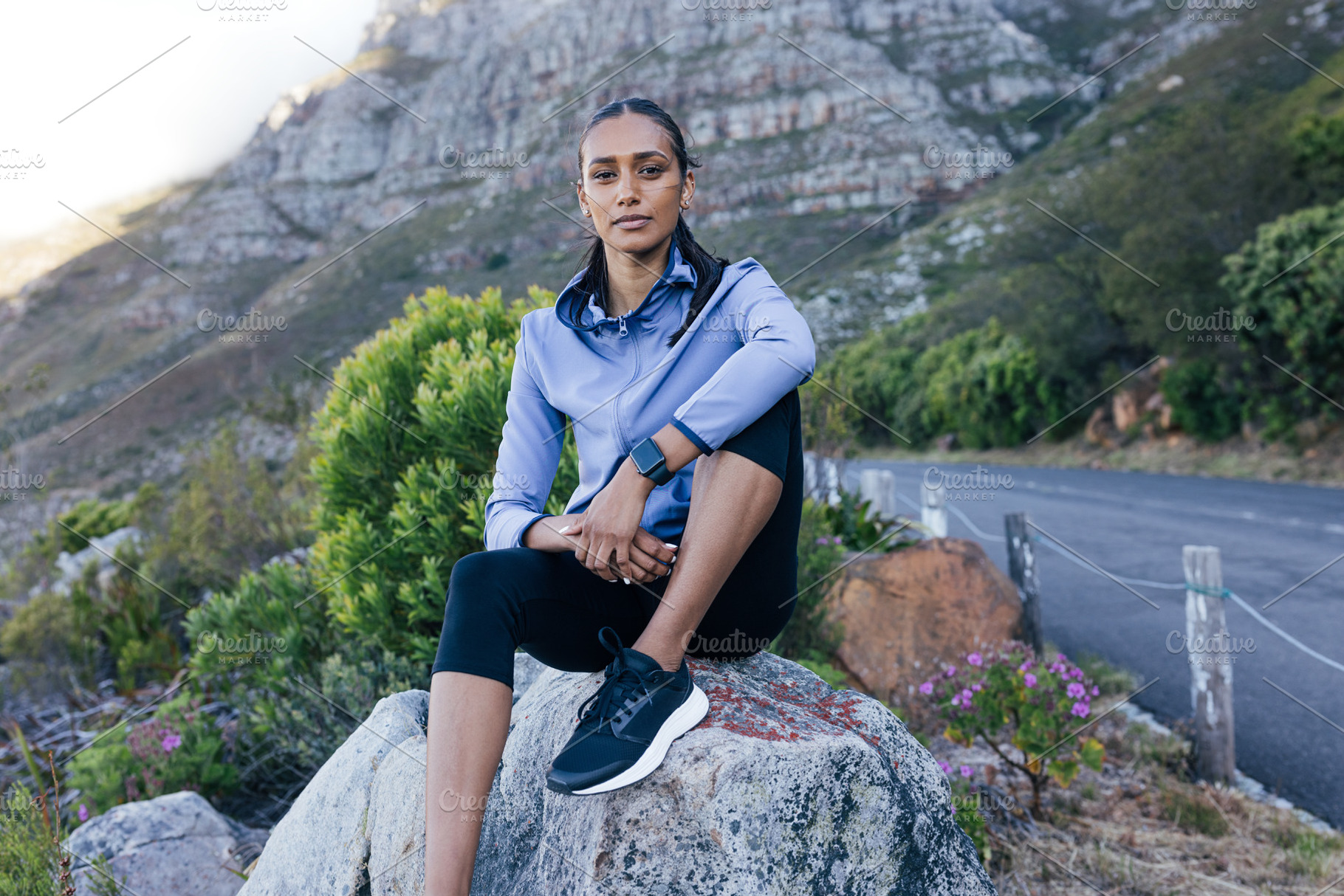 Young slim female sitting on rock, a Sports & Recreation Photo by Artem Varnitsin