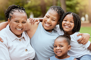 Black family hug of children, mother and grandmother relax together in nature park for freedom, fun quality time and bonding. Love, peace and generations portrait of cute happy kids, mom and grandma, a Photo by Peopleimages.com