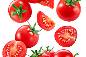 Falling cherry tomatoes and tomato slices isolated on white back, a Food & Drink Photo by Volff