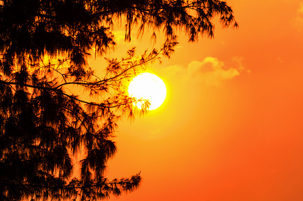 Sky at sunset stock photo containing sun and sunset, a Nature Photo by yongkiet jitwattanatam