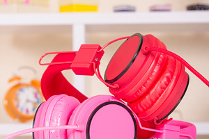 Headphones on table containing background, object, and light