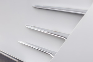 Fragment of vintage white car, a Background Photo by Photo Kaminski