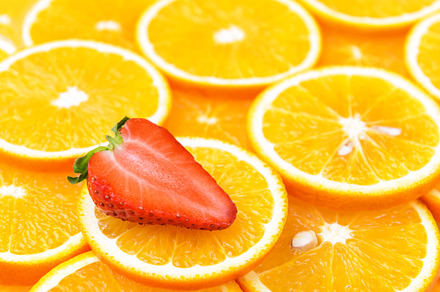 Fresh orange slices with strawberry featuring background, bright, and circle, a Food & Drink Photo by Lopatin Photo