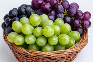 Ripe green and purple grapes in bask, a Food & Drink Photo by Pixeness Studio