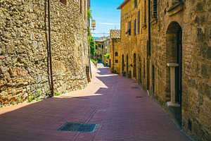 Stone houses and arranged street, a Nature Photo by Alpine Dreams