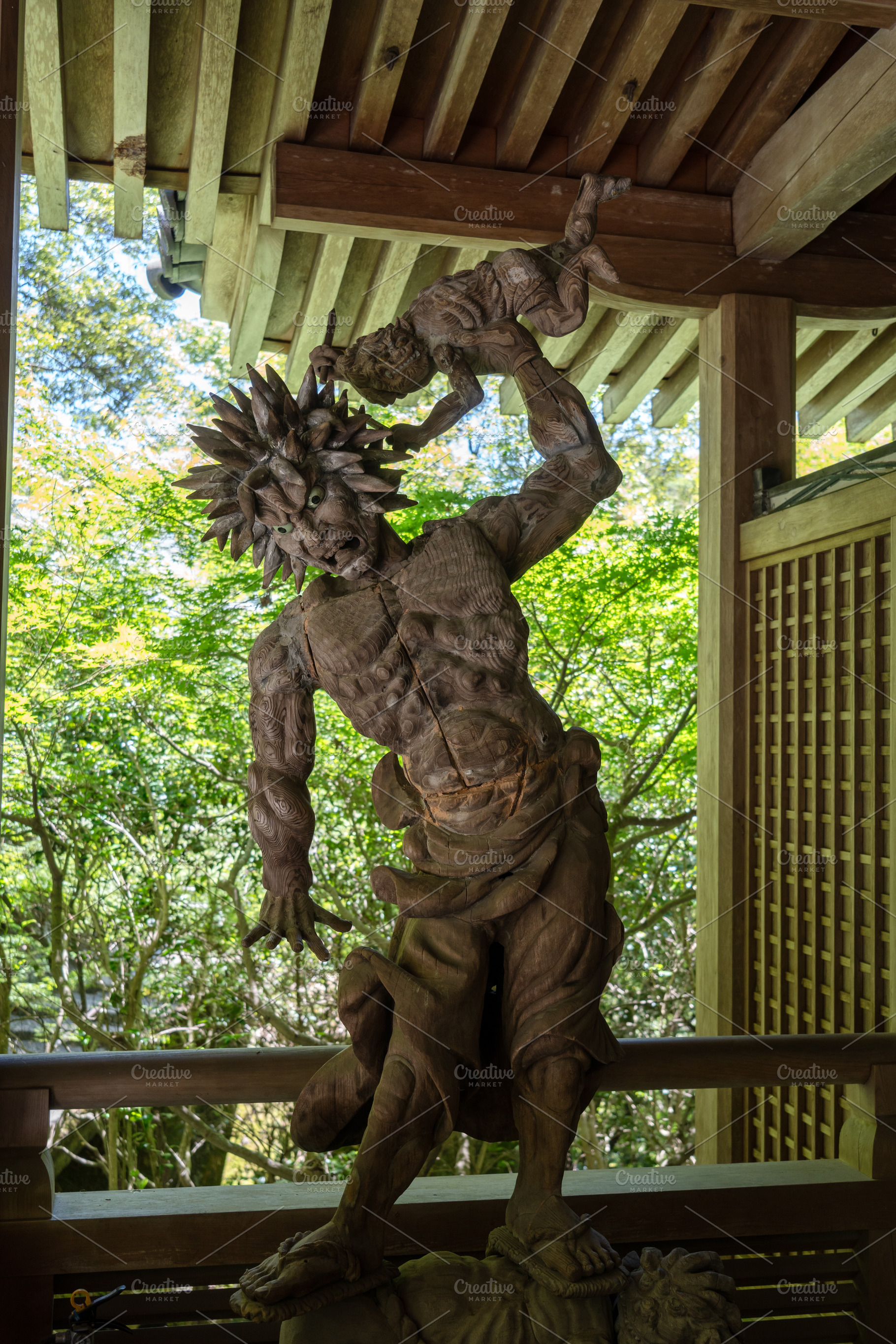 Wooden Oni demon statue at Mitaki-Dera temple in Hiroshima, Japa, an Architecture Photo by GoodGoods