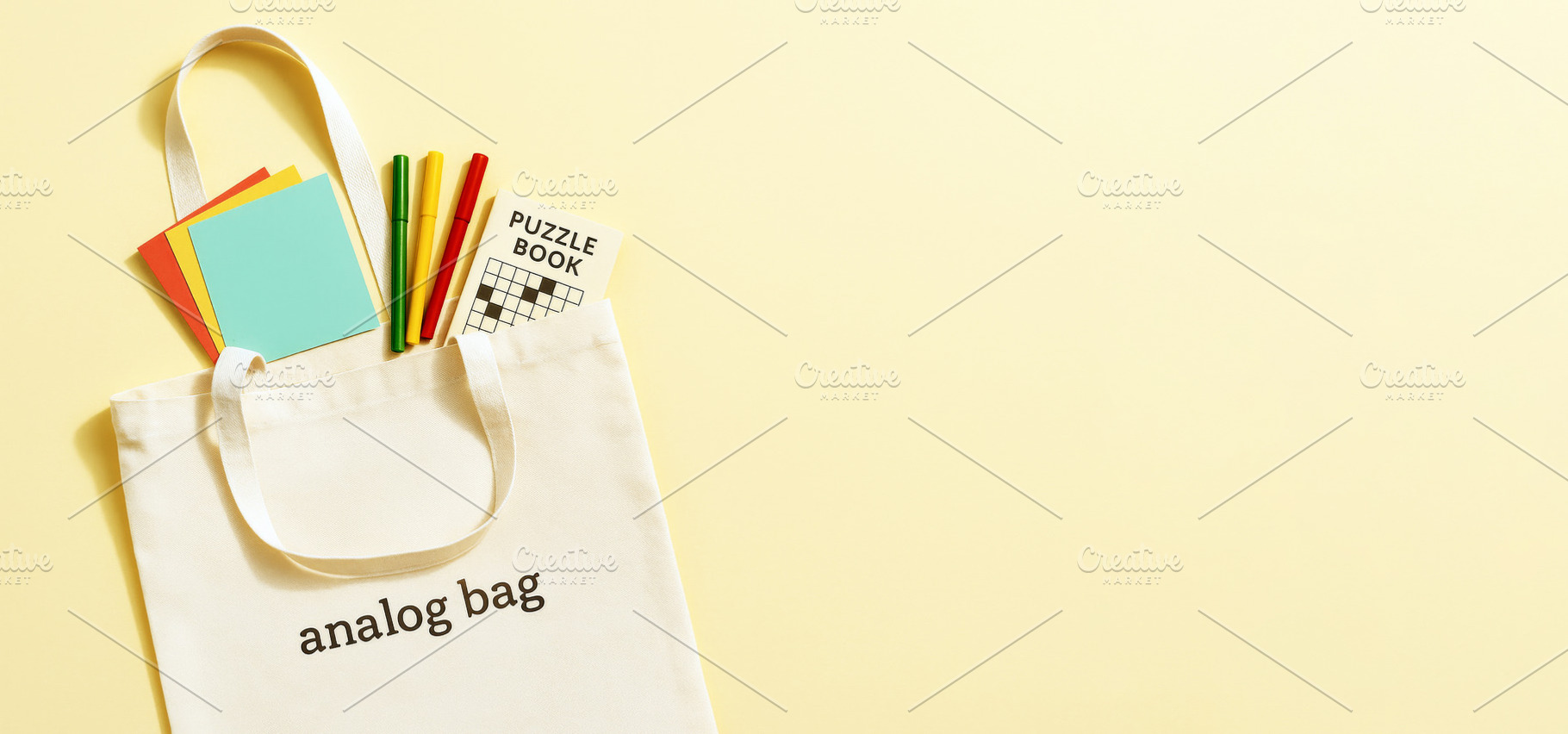 Analog bag with notebooks, puzzle bo, a Photo by Dvoevnore photos