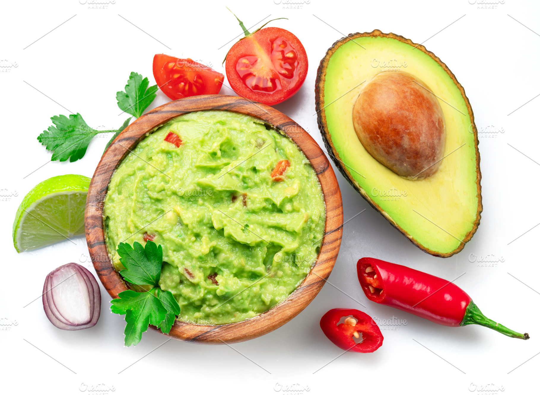 Guacamole and guacamole ingredients on isolated on white backgro, a Food & Drink Photo by Volff