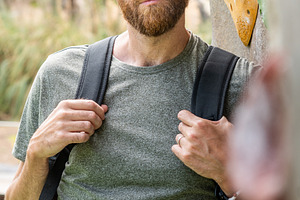 Man standing next to climbing wall outdoors, a Person Photo by etorres69