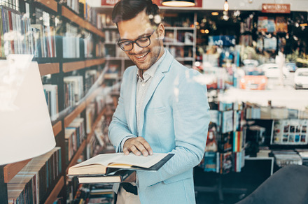 Man in bookstore stock photo containing bookstore and man, a School & Education Photo by REDDOT Studio