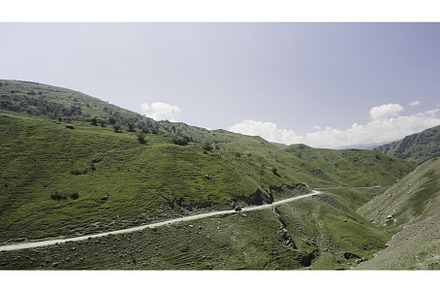 Top view of mountain road with, a Transportation Photo by Media Whale Stock