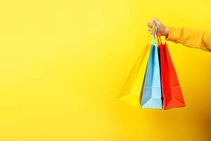Colorful Shopping Bags on Yellow, a Beauty & Fashion Photo by Ales Munt