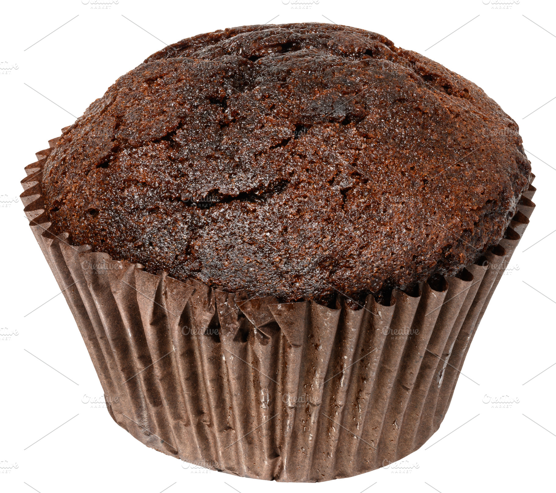 Close up of one chocolate muffin in paper form, isolated backgro, a Food & Drink Photo by ndanko