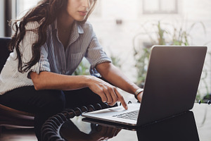 Business woman working on laptop featuring laptop, woman, and using