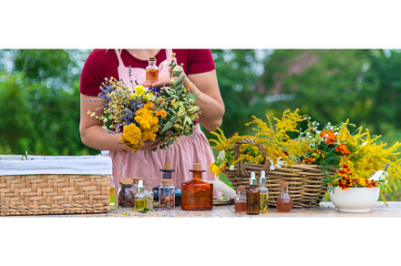 Woman with medicinal herbs and, a Nature Photo by yanadjana