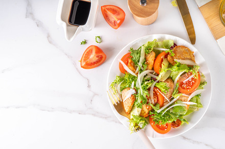 Vegetable salad with grilled chicken, a Food & Drink Photo by Rimma