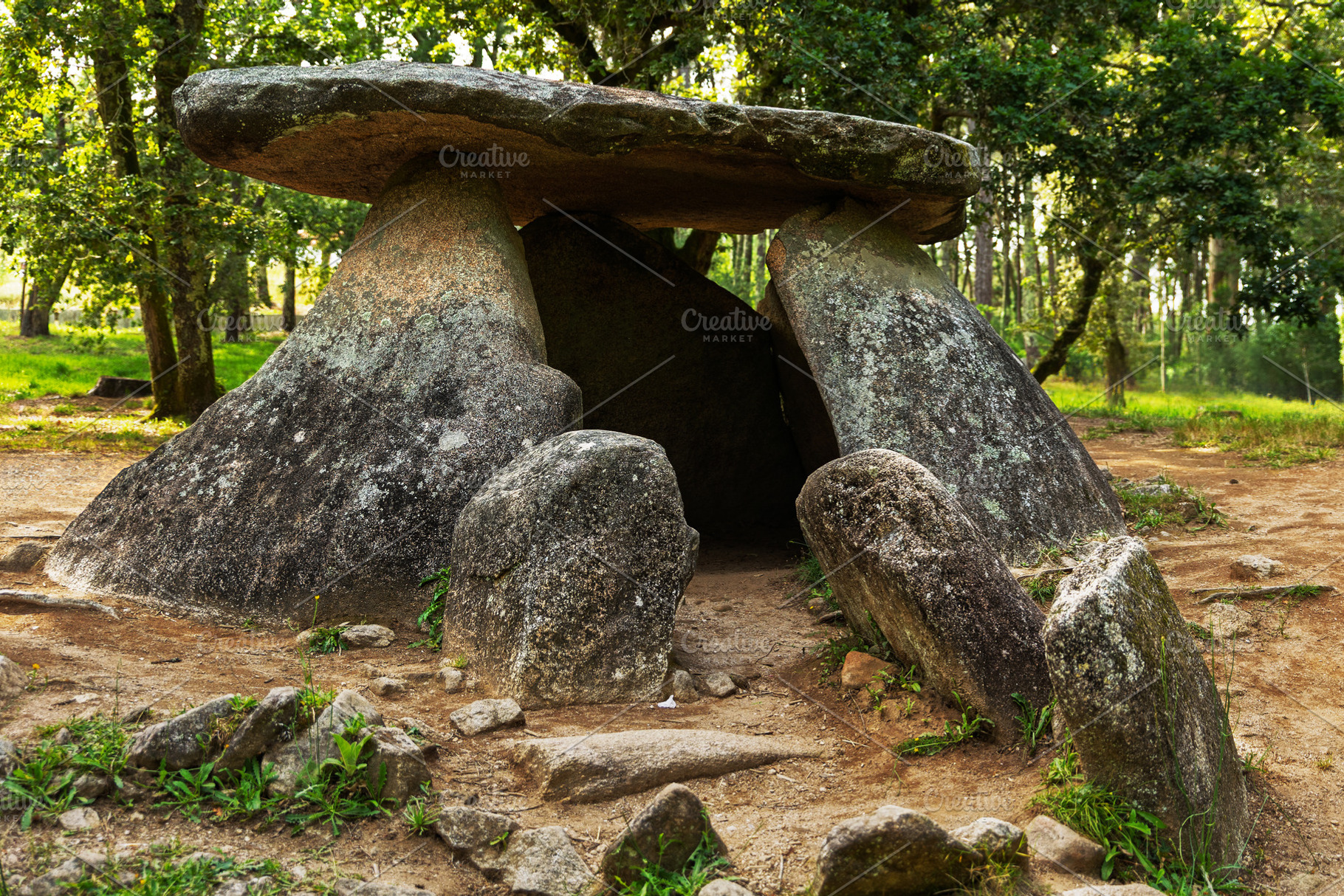 Megalithic stone dolmen in a green f, an Architecture Photo by Perpis