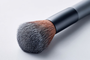 Professional makeup brush on light background, a Beauty & Fashion Photo by AlyaAnd