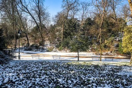 Buttes-Chaumont Park under the snow in winter, Paris, a Nature Photo by GoodGoods