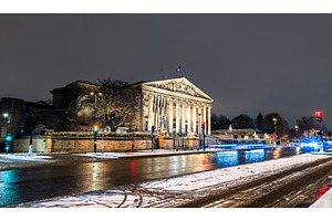 Palais Bourbon illuminated at night