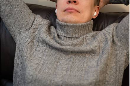 man relaxing on cozy couch, a Holiday Photo by piter.goskov