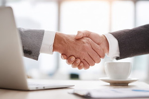 Business meeting leads to handshake, a Photo by Beautiful things