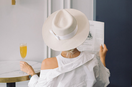 Elegant Woman in White Hat, a Photo by Nina Stock Photos