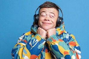 Cheerful man with down syndrome, a Person Photo by MistyDay