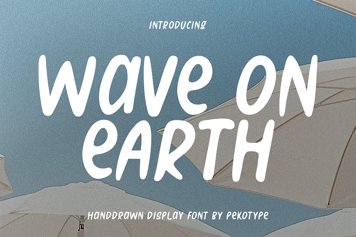 Wave on Earth Beach Handwritten Font, a Handwritten Font by Pekotype (Photo 1 of 15)
