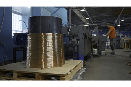 Worker starts machine with copper, an Industrial Photo by Media Whale Stock