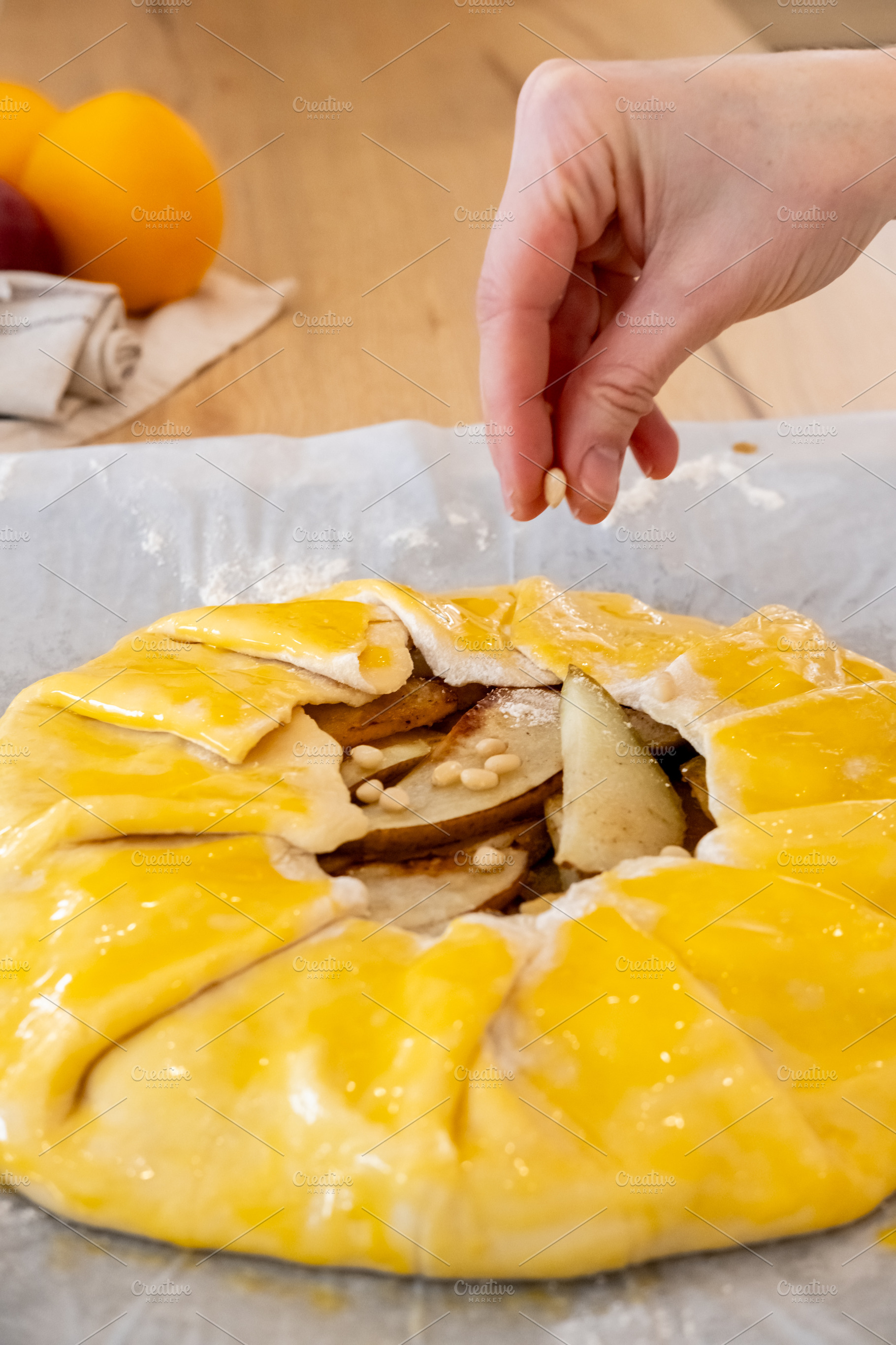 Fruit pastry cooking pie baker hand pine nuts pear, a Person Photo by Photo Drive Studio