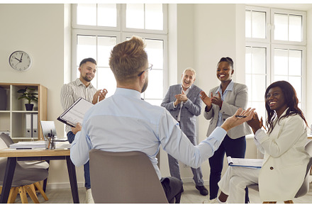 Group of happy diverse business, a Person Photo by StudioRomantic