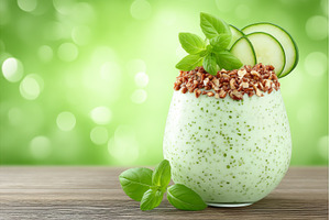 Green smoothie in glasses sits on a, a Food & Drink Photo by ZinetroN