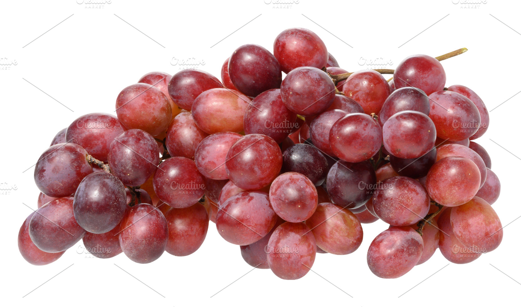 Bunch of ripe, red grapes, isolated  background. The grapes are, a Food & Drink Photo by ndanko