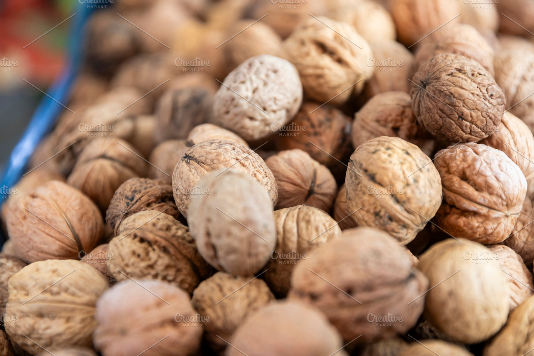 Close-up of Whole Walnuts in Shells, a Food & Drink Photo by Imaginarium