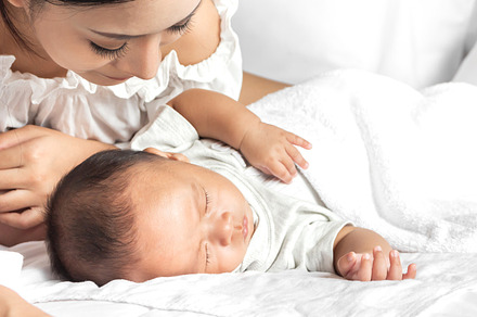 Portrait of enjoy happy love family asian mother playing with ad, a Person Photo by Art_Photo