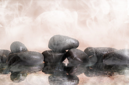 Group of black stones in wather, a Health & Medical Photo by Davizro's Market