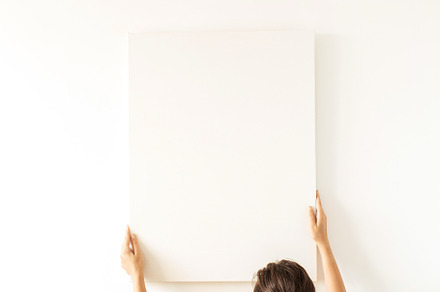 Blank canvas in women's hands stock photo containing young and woman, an Arts & Entertainment Photo by Floral Deco