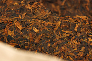Close-up view of a puer tea cake, a Background Photo by darksoul72