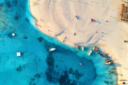Aerial view of the fishing boats featuring beach, sea, and ocean, a Nature Photo by den-belitsky