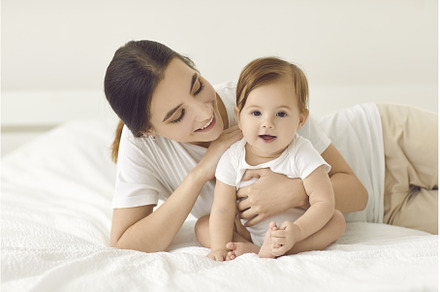 Gentle portrait of young mother and, a Person Photo by StudioRomantic