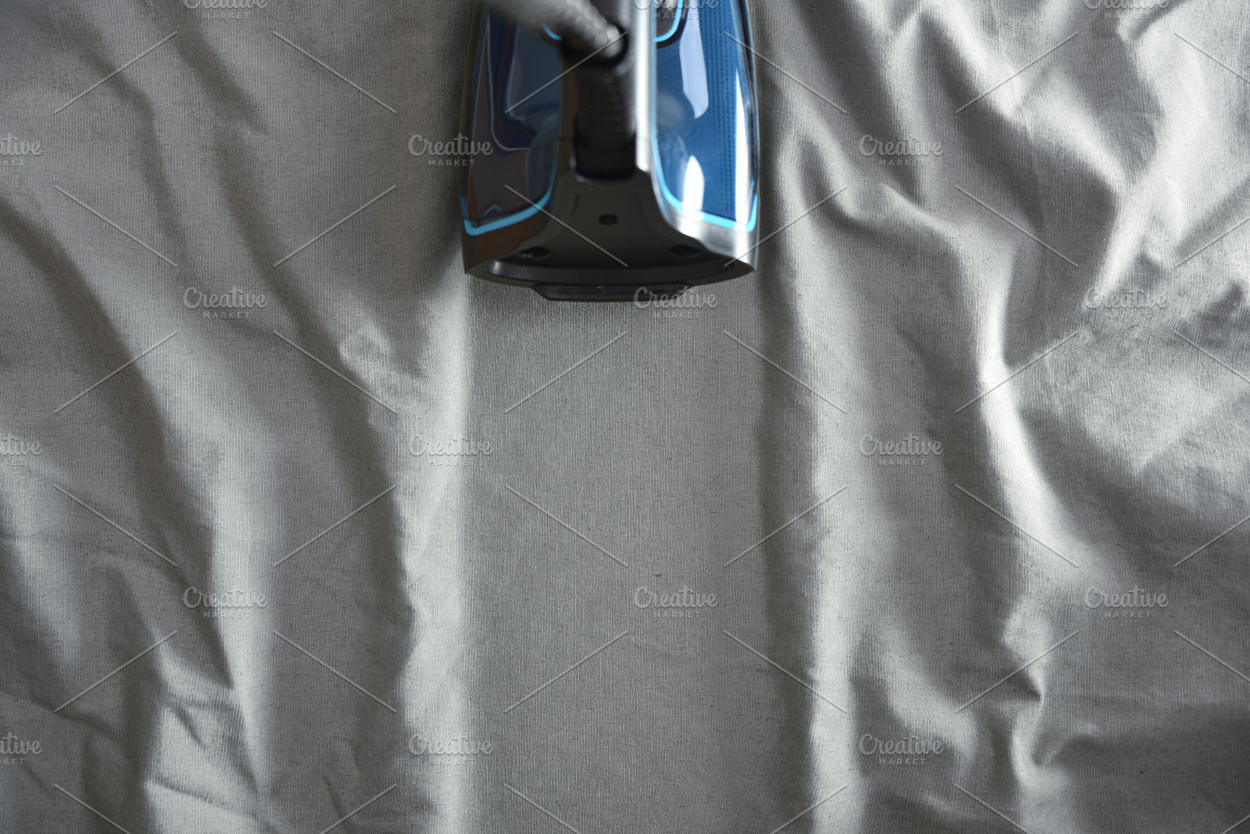 Iron over wrinkled fabric leaving a freshly ironed mark, a Sports & Recreation Photo by Davizro's Market
