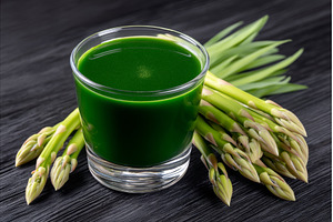 A glass of barley grass juice is set, a Food & Drink Photo by ZinetroN