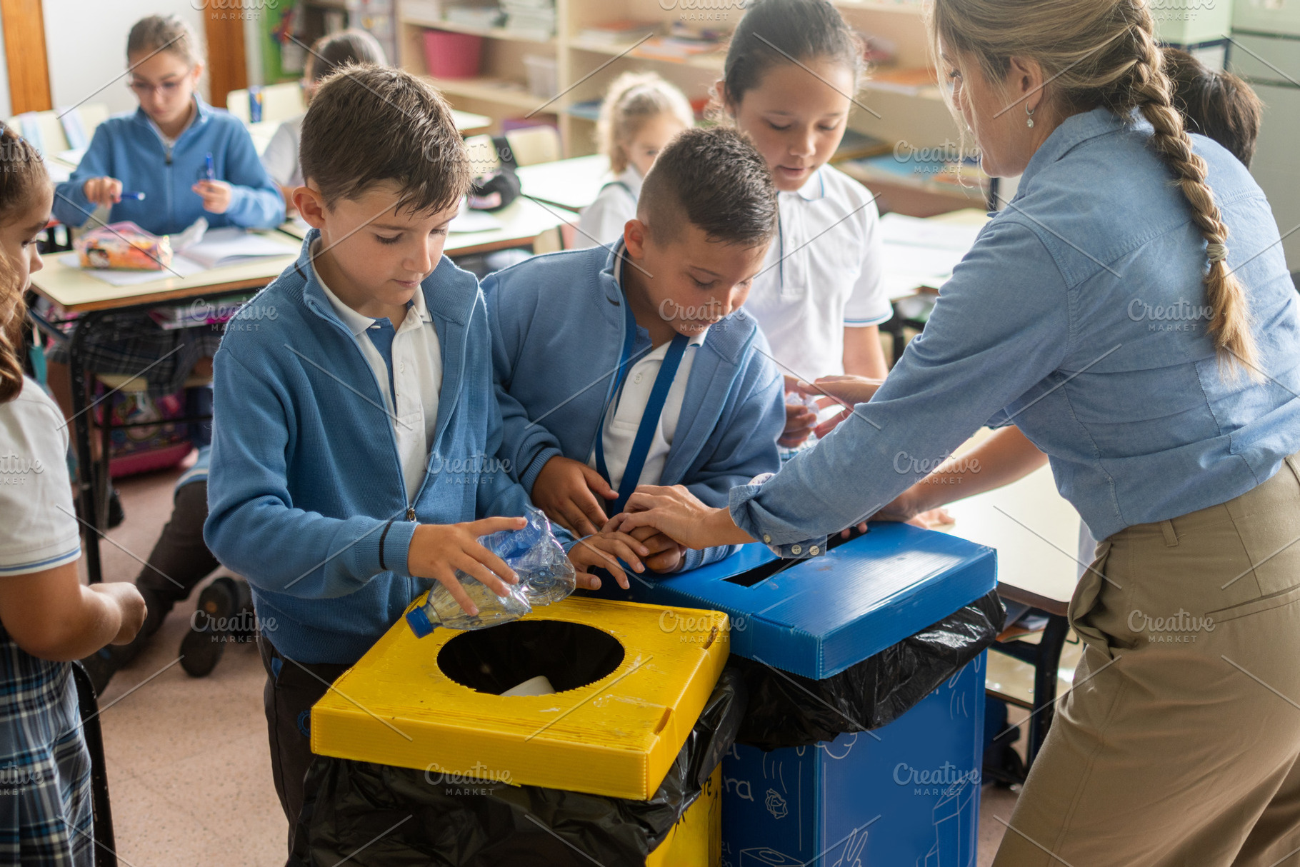 Elementary School Students Learning to Recycle Plastic Bottles, a Photo by etorres69