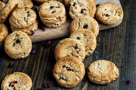 delicious dried cookies made of high-quality flour with dried red cranberries o, a Photo by MyPhotos