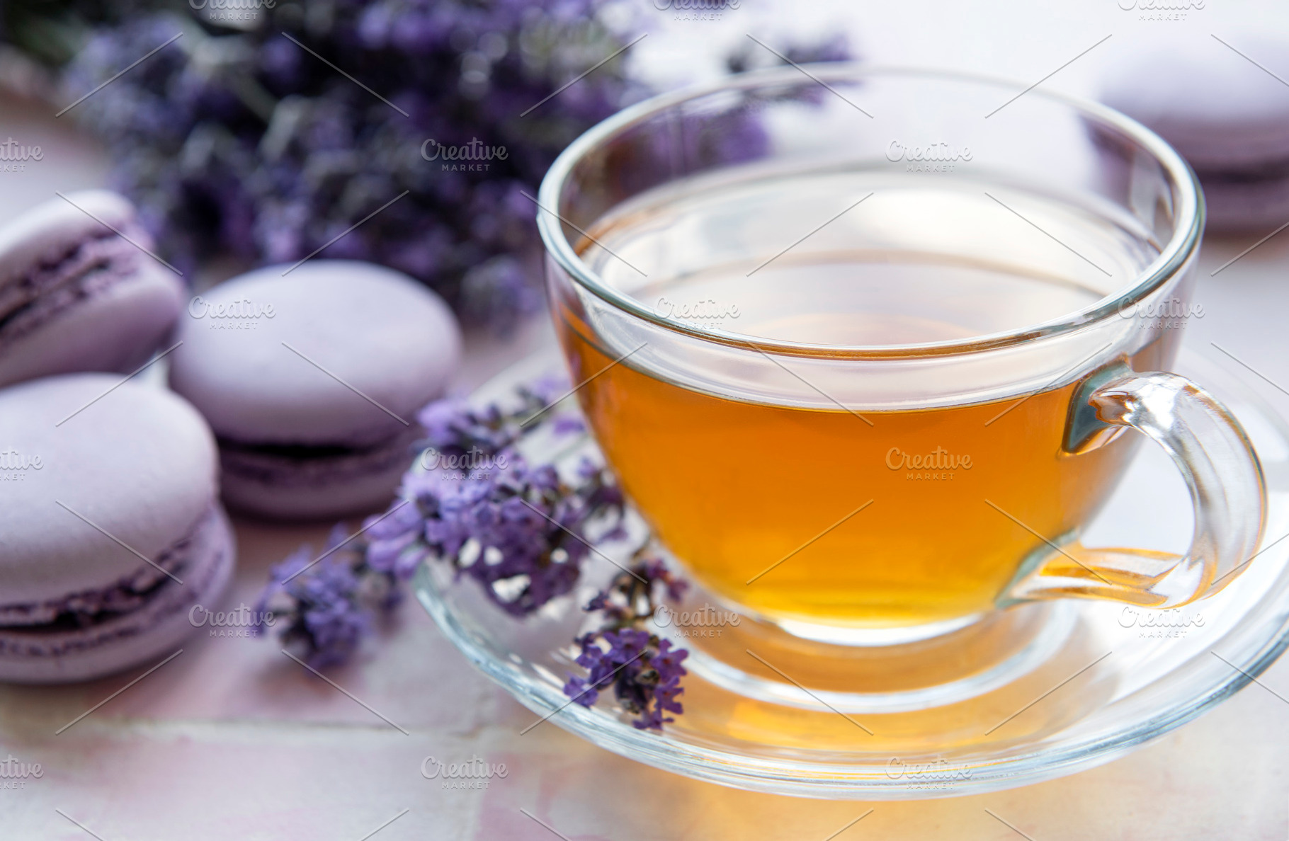 Cup of tea with macaroon dessert with lavender flavor, a Food & Drink Photo by Olena Rudo
