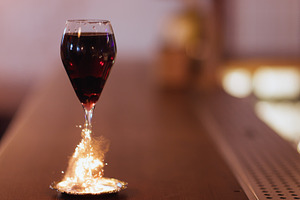 Nightlife cocktail drink sparkler wine fire pub, a Food & Drink Photo by Photo Drive Studio